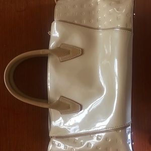 Beautiful cream patent leather with red accents